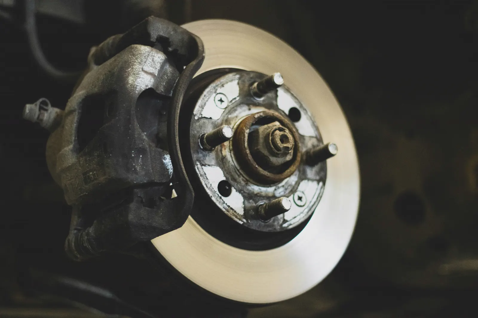 Brake disc and suspension assembly during mechanical inspection