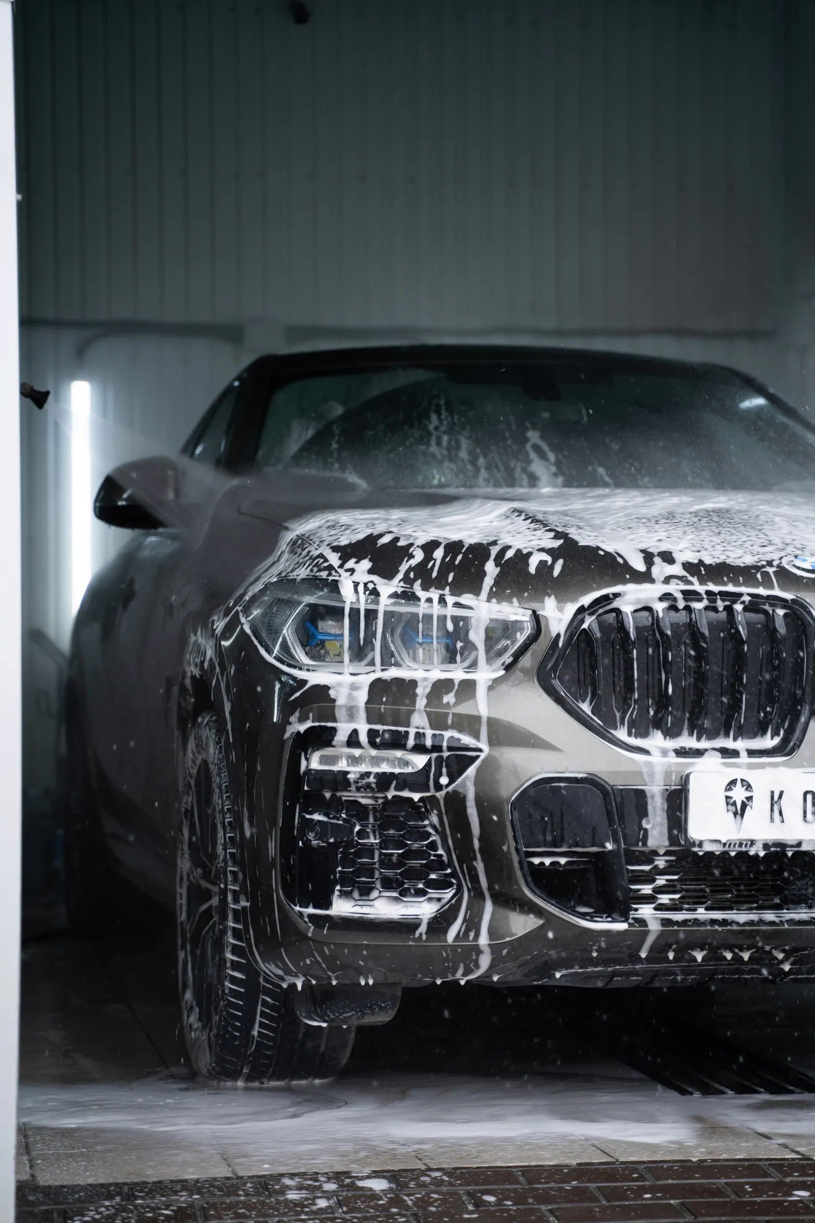 Safe two-bucket wash foam applied to car paint